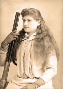 "Annie Oakley by Baker's Art Gallery c1880s-crop" by Baker's Art Gallery, Columbus, Ohio - Heritage Auctions. Licensed under Public domain via Wikimedia Commons - http://commons.wikimedia.org/wiki/File:Annie_Oakley_by_Baker%27s_Art_Gallery_c1880s-crop.jpg#mediaviewer/File:Annie_Oakley_by_Baker%27s_Art_Gallery_c1880s-crop.jpg